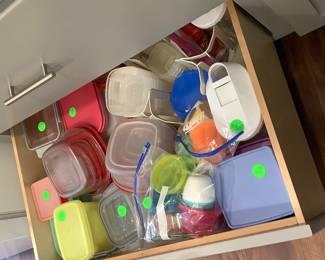 Drawer full of rubber maid and Tupperware.