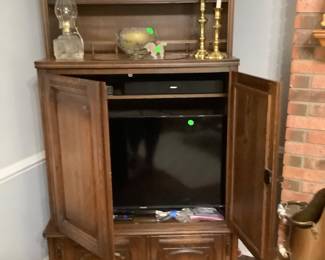 Entertainment center in living room.  Price: 185.00
