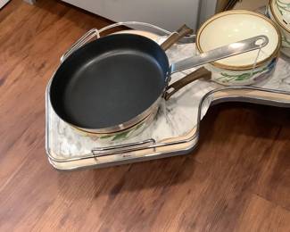 Skillets, boilers in kitchen.