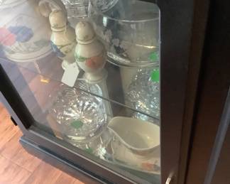 Lower part of black China cabinet with crystal pieces. Price on cabinet: 240.00