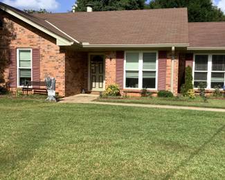 The front of the beautiful house for sale.