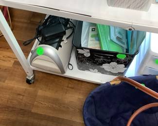Cricket mschine and supplies on bottom.