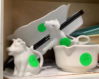 Two cute cow creamers.