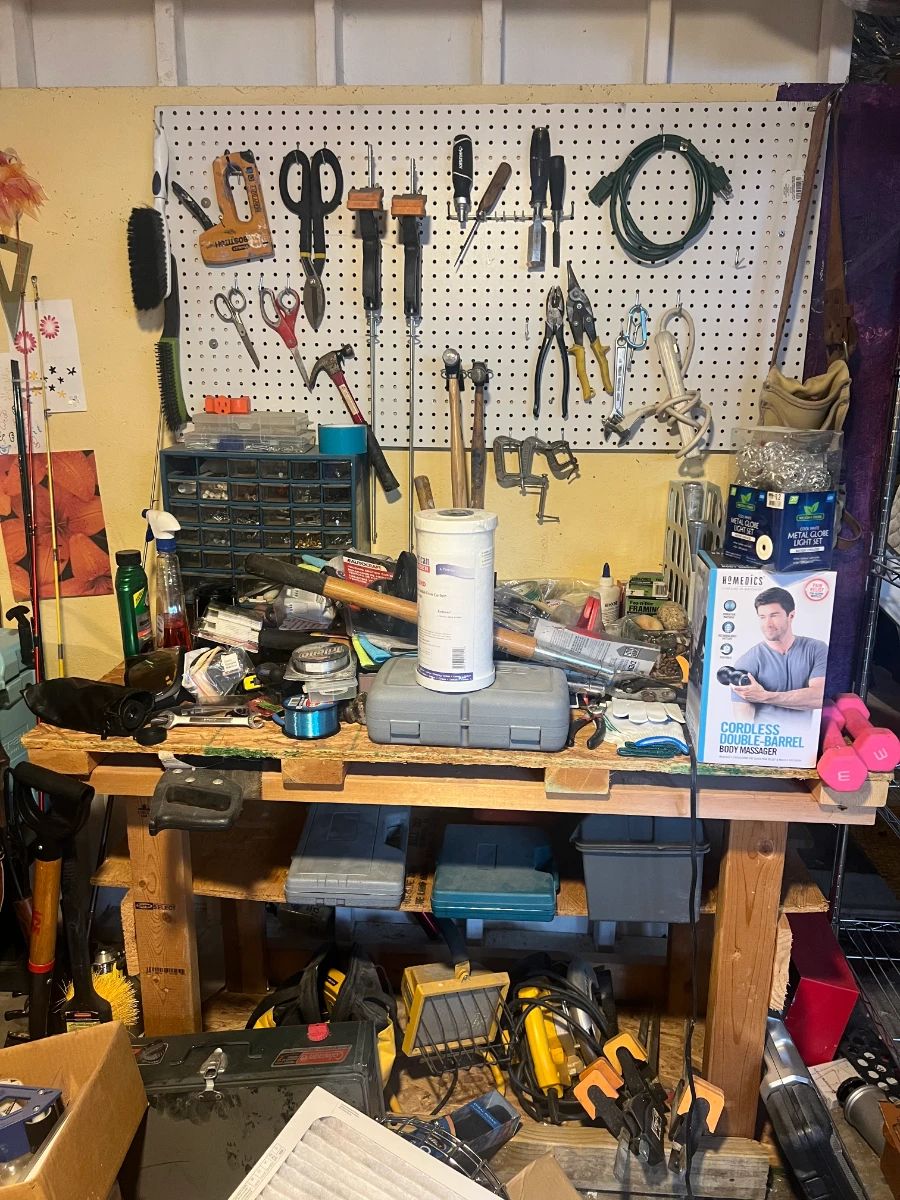 Workbench covered in various tools