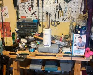 Workbench covered in various tools