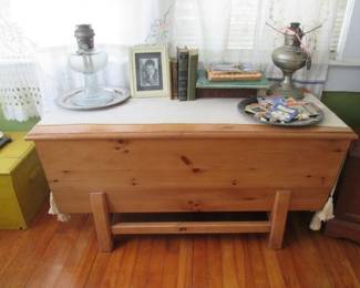 Cedar chest, roomy and fragrant. The oil lamps are for sale, too - and the antique books!