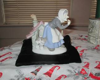 This delightful German porcelain witch (and cat) want to go to your house for Halloween. About seven inches tall. Beautifully made, whimsical, collectible.