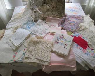 Antique and vintage linens! Groovy 40s-60s tablecloths, crocheted items, adorable embroidered tea towels - what a stash!