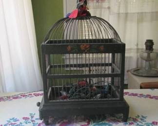 Edwardian wooden birdcage with zinc tray and handpainting. The vintage holiday light string goes with the cage! It's adorable in the season.