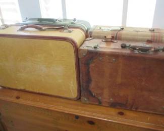 Vintage suitcases, from 19-teens to 1960s. Including but not limited to a 19-teens leather Corbin case, a Sears 60s featherlite suitcase in olive green, a Cari-lite Art Decor case from H&H, and an Aero Luxe. These are getting harder to find.
