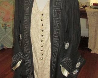 This picture hardly does justice to this magnificent pirate/courtier coat with attached waistcoat. Immaculate tailoring, beadwork, satin lining, and rhinestone embellishments. Includes a wig worn by Rudolf Valentino in a film! Full provenance dates the ownership of both to the 1930s. Be THE Gasparilla pirate in this amazing outfit.