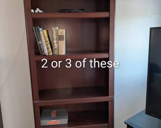 2 tall bookcases