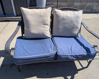 Metal outdoor love seat