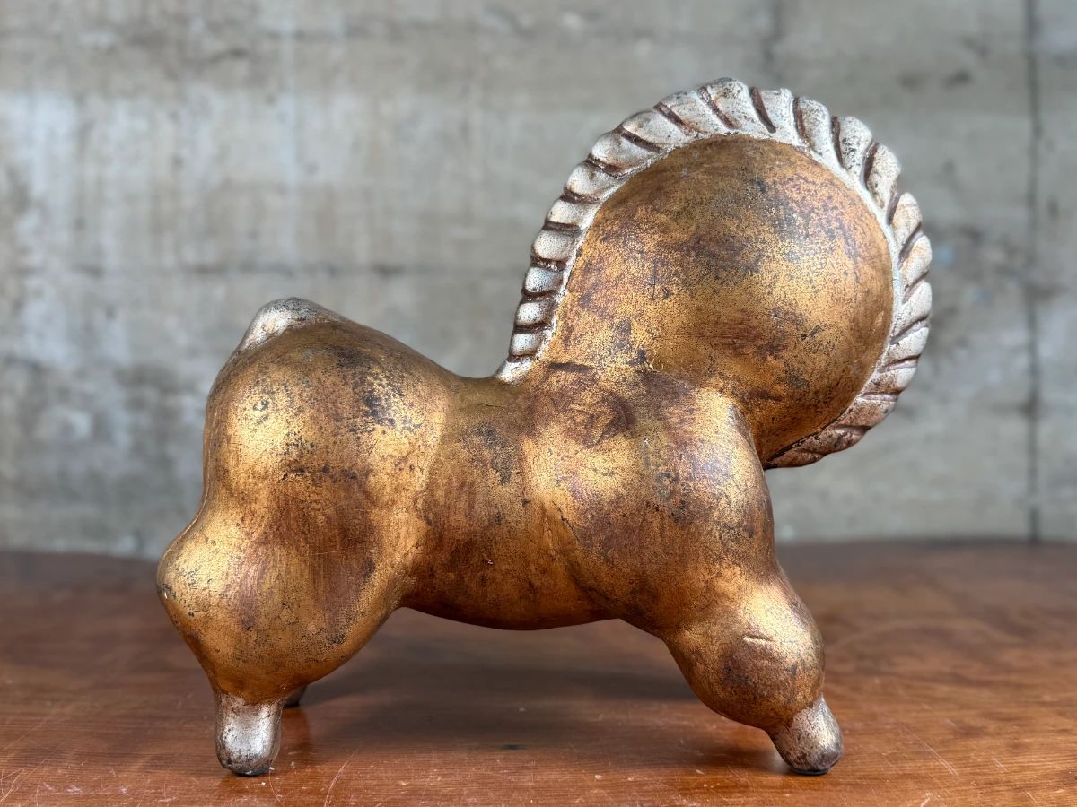 This lot features a unique circus horse sculpture “Libbiloo” by listed designer, Russel Wright circa mid-20th century.