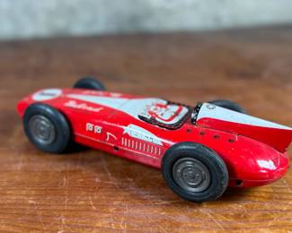 This lot features an antique Belond Special open-wheel tin friction race car, manufactured in Japan by Toymaster.