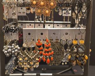 Assorted Paparazzi and Fashion Costume Jewelry Earring Collection on Display Rack