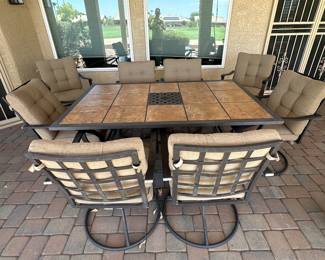 Patio Table with 8 swivel chairs - Good Condition