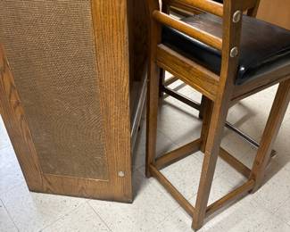 Side view of the stand-alone bar and the back of the barstool