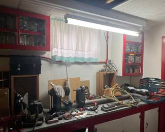 Large has motor under-counter, new grilling set, socket set, misc