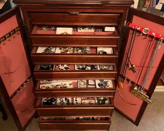 Costume jewelry.  This cabinet is not for sale 