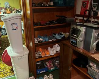 Lots of shoes, laundry baskets