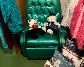 Bright green vinyl chair, stuffed animals pillows