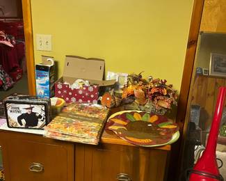 Vintage cabinet, placemats/ table clothes John Wayne lunch pail, fall decor, dirt devil vac