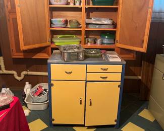 Cabinet, misc plastic storage and dishes