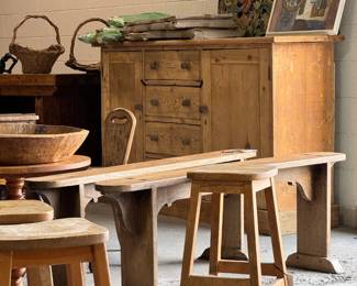A glimpse at an (unorganized) collection of items that will be available...antique English pine cupboard, french needlepoint, art, baskets, stools, benches