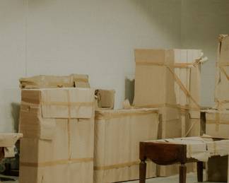 lots to unwrap still...sideboards, dressers, chests of drawers...lots of english pine and french oak