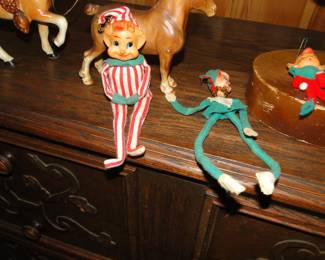 Vintage elves, scheming about what to do