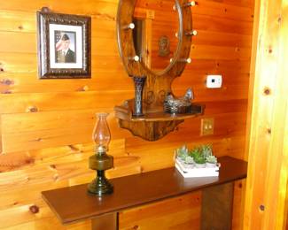 Nice oval mirror with hooks, and shelf