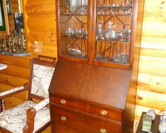 Solid wood, mahogany hutch, which doubles as a secretary 
