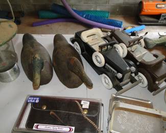 Wooden duck decoys, and some model wooden cars