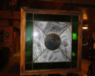 Square piece of framed stained glass
