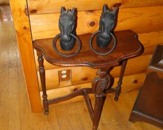 Solid cast iron horse tethers and a nice table too