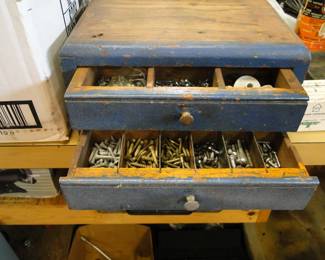 Screws, in a wooden drawer