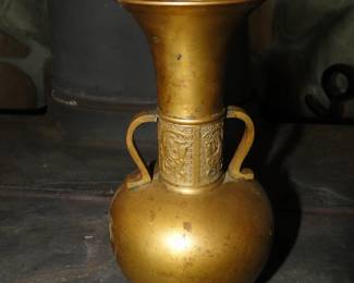 Brass oriental vase with markings, on the bottom.  