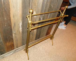 Brass quilt holder