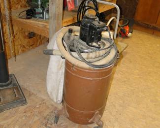 Large canister vacuum for sawdust collecting