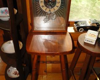 A few stools and a clock