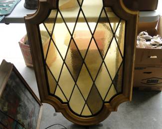 Fancy stained glass window, with different shades of amber glass
