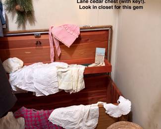 Lane Cedar Chest with key and vintage baby clothes