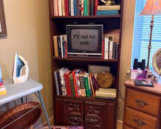 Book shelf, books & Boy Scout canteen, globe