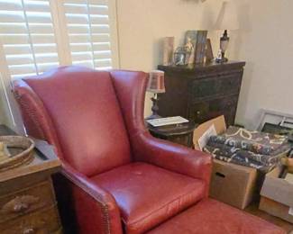 Fantastic weather in King Hickory chair and ottoman ( the lighting has been tough to get right in this house but this is the more accurate color) orange/red