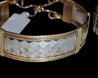Ronaldo Designer Jewelry features a distinctive knot design accented with sterling silver and 14k gold-