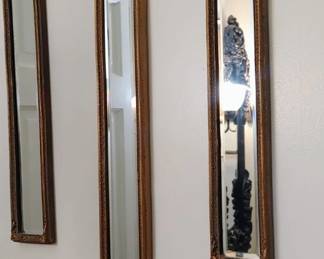 Hickory Manor House narrow decorative gold wall mirror set featuring an ornate, traditional antique-style frame beveled