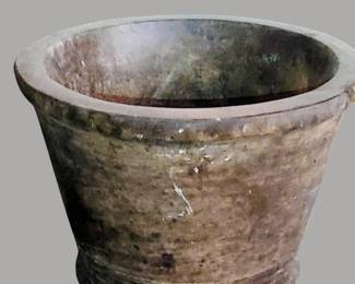 Late 1800s gigantic and heavy concrete handmade pot with drainage hole located in the basement