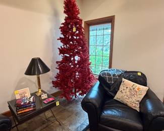 9ft red tinsil Christmas tree, black leather chair, shadowbox endtable