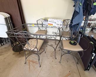 Wrought iron patio table and chairs (needs new glass table top)